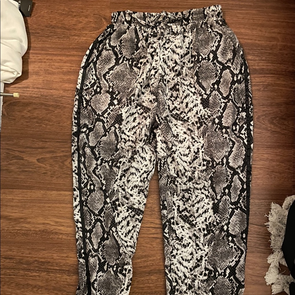 Pretty Little Thing Snakeskin Joggers. Never worn.